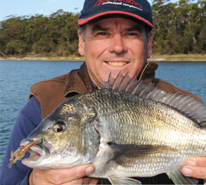This overhead has been modified with electric gears to aid in deep water fishing. Note it's spooled with mono - not great for serious offshore work - heavy braid is the go.