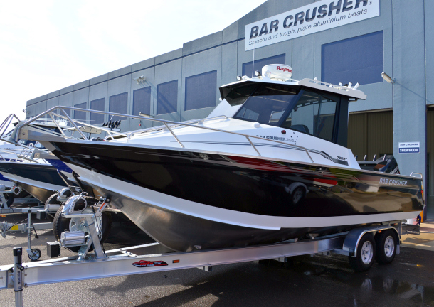 Fisho's Scott Thomas filming Bushy talking about Squidgy's new prawn lures.