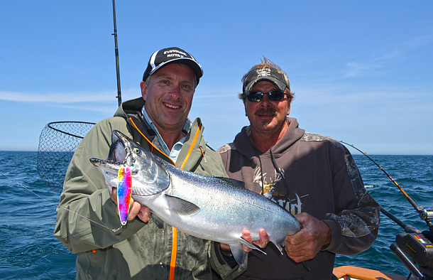 Fisho's Scott Thomas filming Bushy talking about Squidgy's new prawn lures.