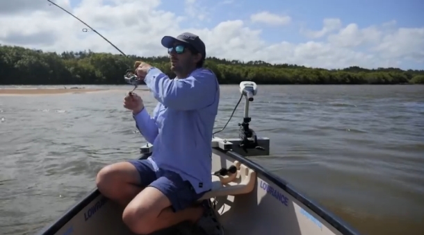 Chris Cleaver with his recently caught and released hybrid cod he likes to call a Murrout (cross between a Murray and trout cod).